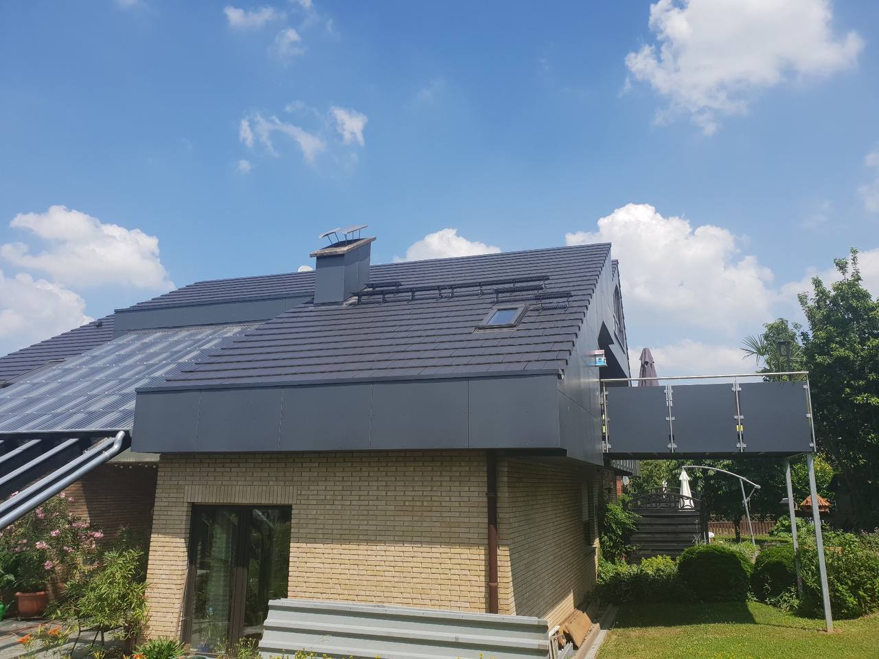 Einfamilienhaus Dacheindeckung mit Zinkgauben